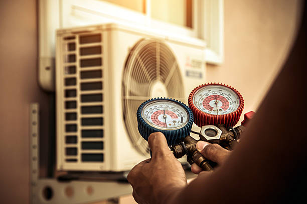 Professional Air Conditioning Service technician working in Deerfield Street, NJ